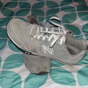 New Balance sneakers, size 8.